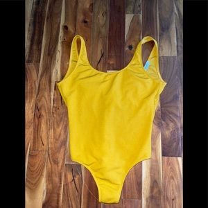 Yellow one piece bathing suit, never worn